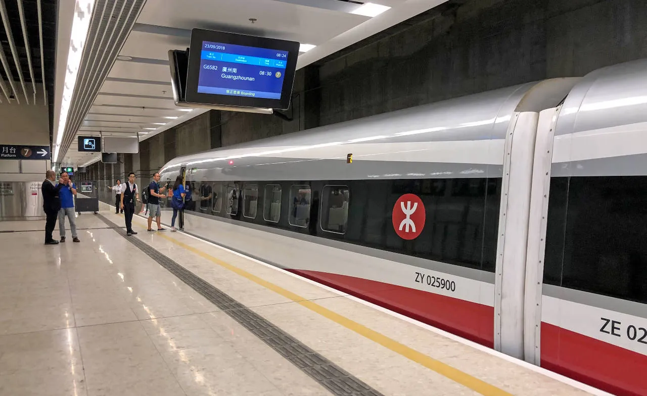 Vibrant Express high speed train at West Kowloon Station platform heading to Mainland China