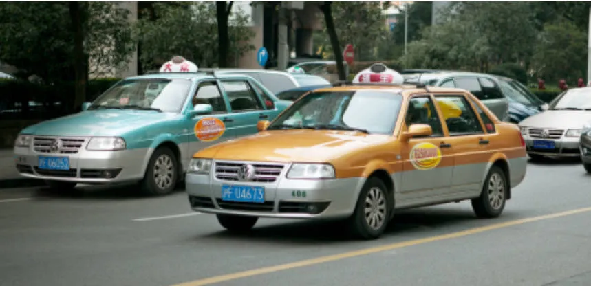 Traditional Dazhong metered taxi cab on the streets of Shanghai