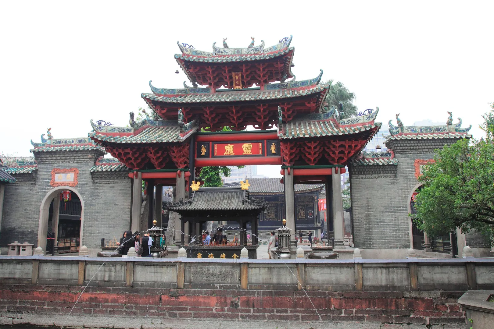 Foreign tourist exploring Lingnan Tiandi historic district in Foshan China