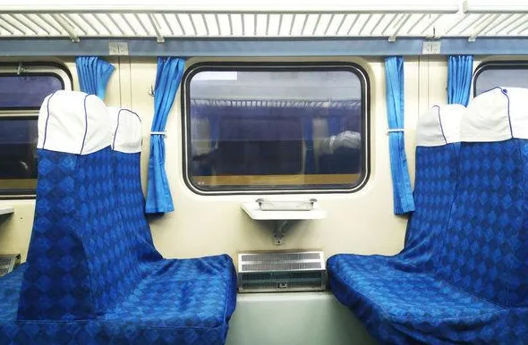 Crowded hard seat carriage on a Chinese K-train during peak travel season