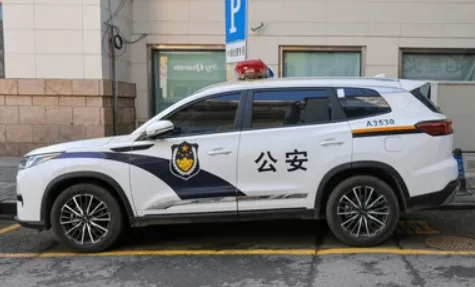 Chinese public security police car responding to emergency call 110